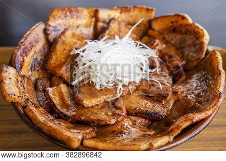Selective Focus Of Grilled Pork Rice Bowl / Butadon In The Restaurant (japanese Food)