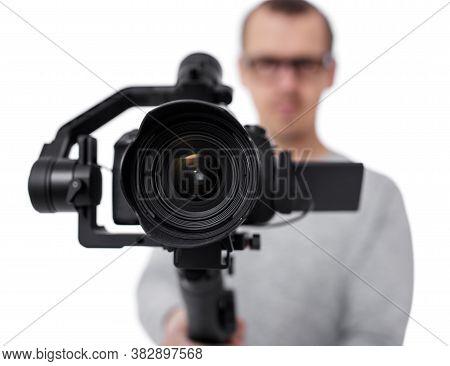 Close Up Of Dslr Camera On 3-axis Gimbal Stabilizer In Videographer Hands Isolated On White Backgrou