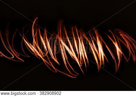 Abstract Neon Lights Trails In The Black Background. Futuristic Overlay Light Pattern.