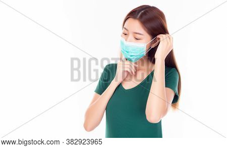 Beautiful Young Asian Woman Wear Protective Face Mask. Protection Versus Viruses, Infection And Prot