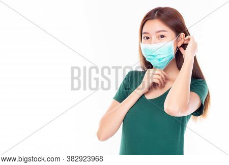 Young Asian Woman Wearing Protective Face Mask. Protection Versus Viruses, Infection And Protection