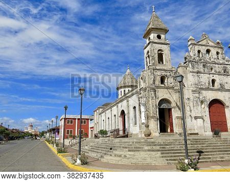 Nicaragua. Street Vue With Guadalupe Church And Granda Cathedral,