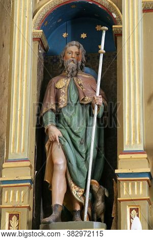 ROZGA, CROATIA - SEPTEMBER 15, 2012: Saint Roch statue on the altar of the Immaculate Heart of Mary in the Church of St. Anne in Rozga, Croatia