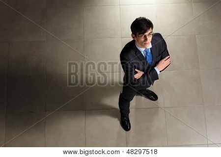 Young businessman in glasses