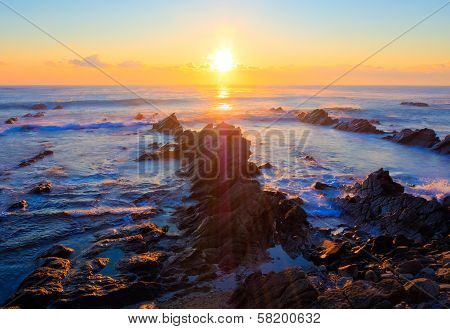 Sunrise over the sea - cretaceous sedimentary rocks