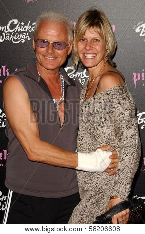 Michael Des Barres and friend at the opening of a Los Angeles outpost of Pink Taco. Pink Taco, Westfield Century City Mall, Los Angeles, CA. 06-28-07