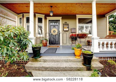 Pretty Column Porch With Wooden Ceiling