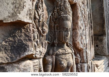 Aspara art of angkor wat temple ruins camboida
