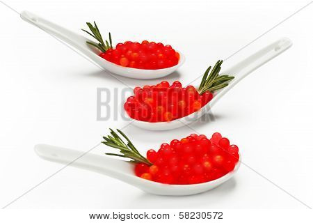 Red Caviar And Rosemary On Porcelain Spoons Uncluttered