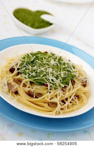 Italian pasta with pesto sauce.