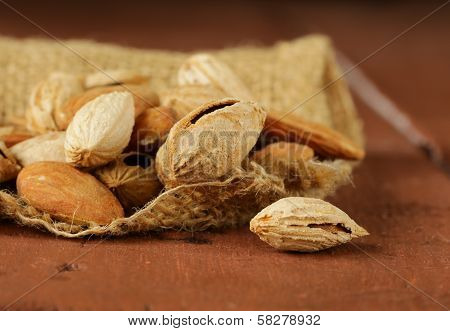 pile of peeled and inshell almonds - delicious and healthy nuts