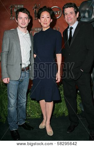 Elijah Wood with Sandra Oh and Alan Rosenberg at the press conference announcing the nominations for the 13th Annual Screen Actors Guild Awards. Pacific Design Center, West Hollywood, CA. 01-04-07