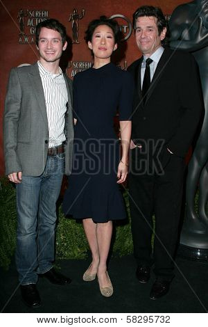 Elijah Wood with Sandra Oh and Alan Rosenberg at the press conference announcing the nominations for the 13th Annual Screen Actors Guild Awards. Pacific Design Center, West Hollywood, CA. 01-04-07