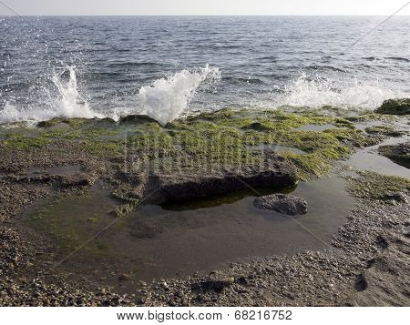 Sea Waves Hitting Rocky Shore
