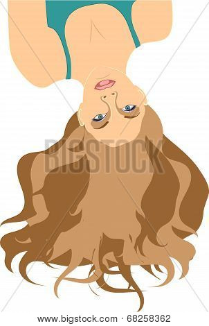 The girl lies headfirst with the dismissed long hair