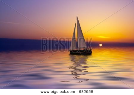 Vela ao pôr do sol