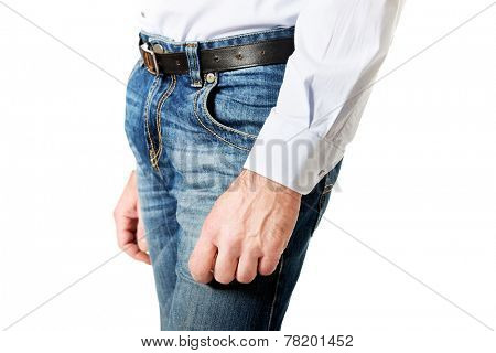 Side view of a men in jeans trousers.