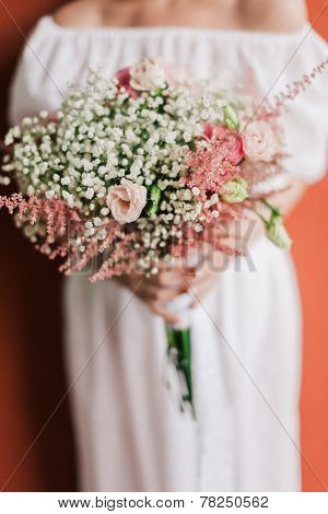 Wedding Bouquet In Bride's Hands Closeup
