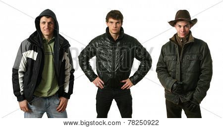 Three young sexy men in winter clothes isolated on white