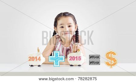 Little Girl Putting Money On A Piggy Bank With A New Year 2015.saving Concept From 2014 Until 2015