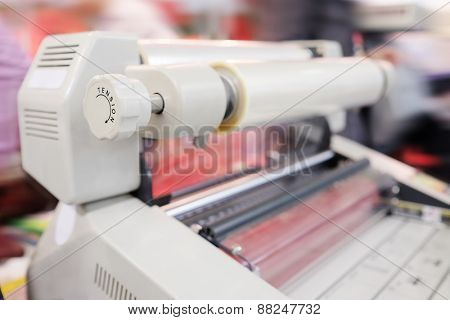 The image of a laminating machine