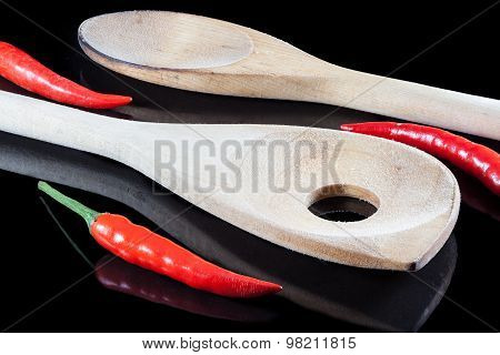 Peppers And Wooden Spoons