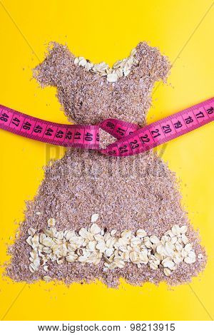 Dress Shape Made From Bran With Measure Tape