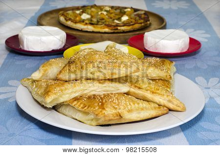 A plate of cheese Bourekas on a table during Shavuot Jewish Holiday.