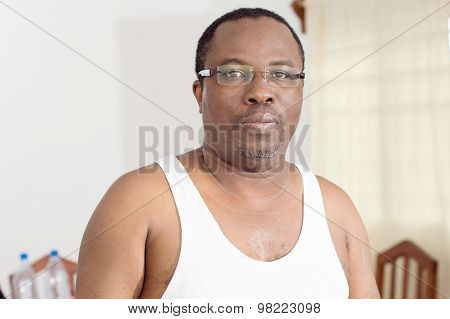 In the morning in his living room and relaxed