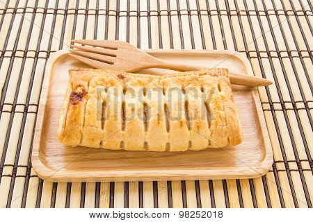 Pineapple Pie In Wooden Plate On Wooden Background