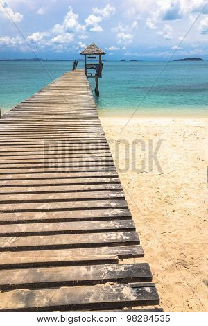 Wood walkway to pier sea side.