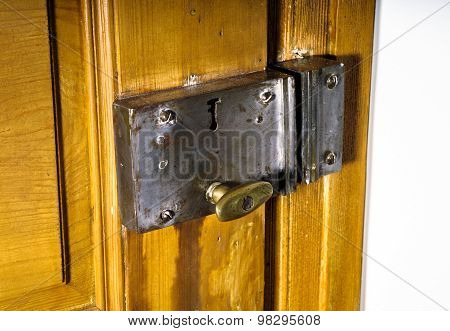 Old Metal Keylock On Retro Wooden Door