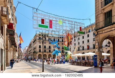 Alicante Spain - June 20 2017: Preparation for The Bonfires of Saint John holiday in the Alicante city. Decorations are structures made of cardboard wood or cork which are exhibited in the streets of Alicante during the festival and are set on fire on the