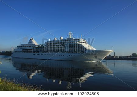 Velsen The Netherlands - June 18th 2017: Silver Whisper- Silversea Cruises on North Sea Channel towards Amsterdam Cruise terminal