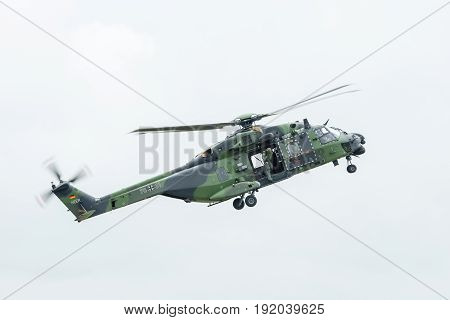 BERLIN GERMANY - JUNI 01 2016: Flight helicopter NH90 of the German Army. Exhibition ILA Berlin Air Show 2016