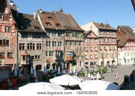 Stein am Rhein Switzerland - 27 August 2008: People wanking and sitting on restaurants at the old village of Stein am Rhein on Switzerland