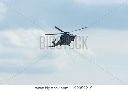 BERLIN GERMANY - JUNE 02 2016: Helicopter NH90 of the German Army. Demonstrative performance. Exhibition ILA Berlin Air Show 2016
