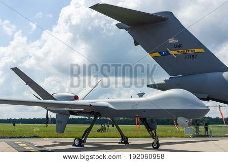 BERLIN GERMANY - JUNE 02 2016: Unmanned combat air vehicle General Atomics MQ-9 Reaper. US Air Force. Exhibition ILA Berlin Air Show 2016