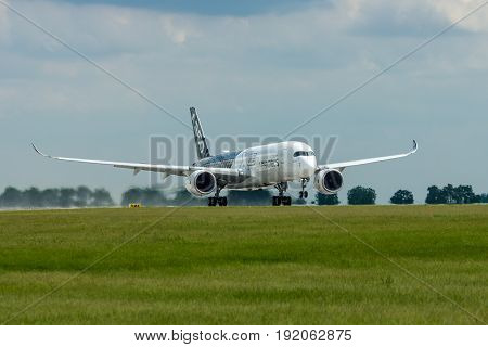 BERLIN GERMANY - JUNE 02 2016: Takeoff an aircraft Airbus A350 XWB. Exhibition ILA Berlin Air Show 2016