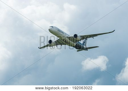 BERLIN GERMANY - JUNE 02 2016: Demonstration flight Airbus A350 XWB. Exhibition ILA Berlin Air Show 2016