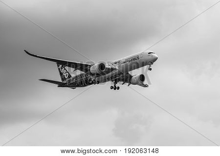 BERLIN GERMANY - JUNE 02 2016: Demonstration flight Airbus A350 XWB. Black and white. Exhibition ILA Berlin Air Show 2016