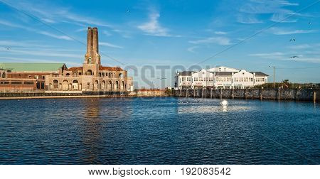 ASBURY PARK NEW JERSEY - SEPTEMBER 11 - A panoramic view of Sunset Lake with classic and new Asbury Park architecture on a late Summer day in New Jersey.