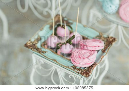 Beautiful multicolored decorated baked sweet tasty candy bar desserts