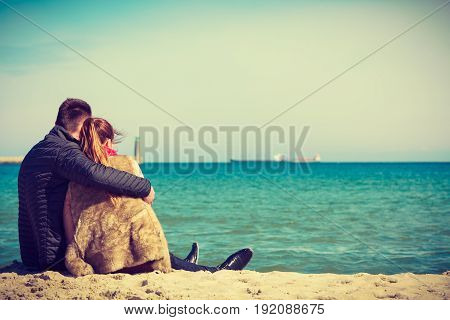 Romance beautiful relantionship concept. Happy couple having date on beach near sea.
