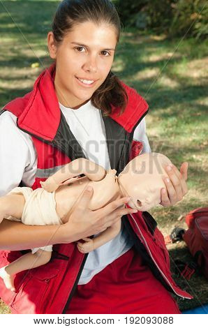 Infant Cpr On Dummy Outdoors, Color Image, Vertical Image