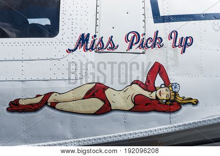 BERLIN GERMANY - JUNE 03 2016: Figure in style Pin-up girl on board a maritime patrol and search-and-rescue seaplane Consolidated PBY Catalina (PBY-5A). Exhibition ILA Berlin Air Show 2016