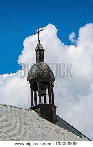 Close up of bellow tower in Megève, French Alps, alpine landscape, blue sky with clouds