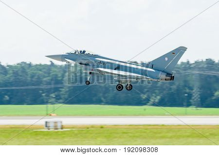 BERLIN GERMANY - JUNE 03 2016: Landing multirole fighter Eurofighter Typhoon. Exhibition ILA Berlin Air Show 2016