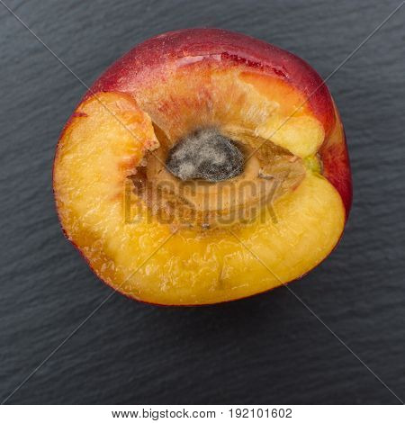 Ripe Apricot Ion Black Background Of Slate Or Stone