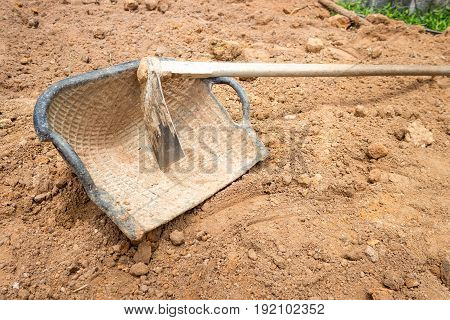 industry consrtuction site work hoe and basket on ground